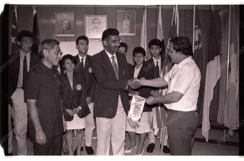 HANDING OVER FLAG TO SQUASH SQUAD TO CALCUTTA