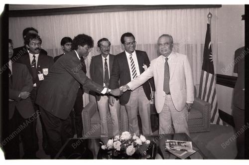 GHAFAR BABA HANDS OVER MALAYSIAN FLAG