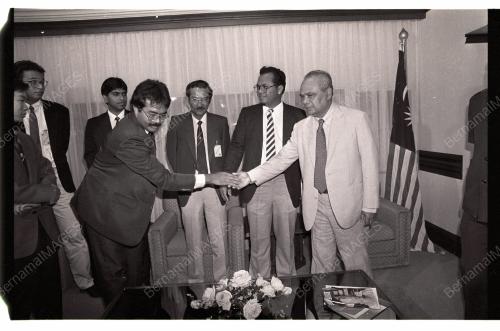 GHAFAR BABA HANDS OVER MALAYSIAN FLAG