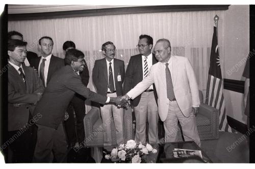 GHAFAR BABA HANDS OVER MALAYSIAN FLAG