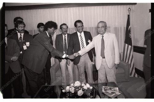 GHAFAR BABA HANDS OVER MALAYSIAN FLAG