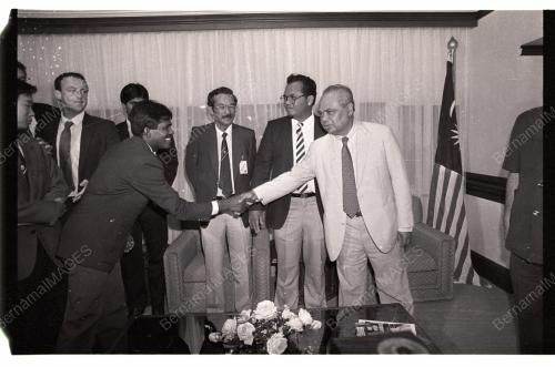 GHAFAR BABA HANDS OVER MALAYSIAN FLAG