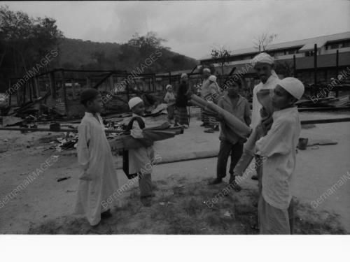 KEBAKARAN DI PERKAMPUNGAN ARQAM