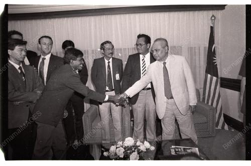 GHAFAR BABA HANDS OVER MALAYSIAN FLAG