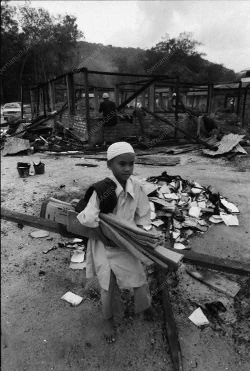 KEBAKARAN DI PERKAMPUNGAN ARQAM
