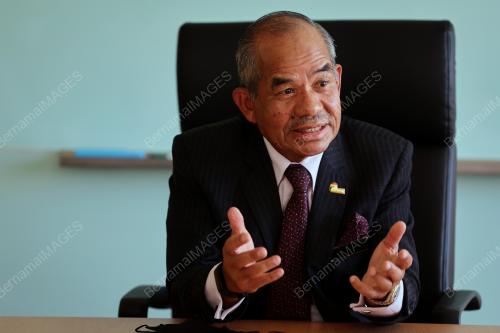 TAN SRI MOHD SIDEK HASSAN
