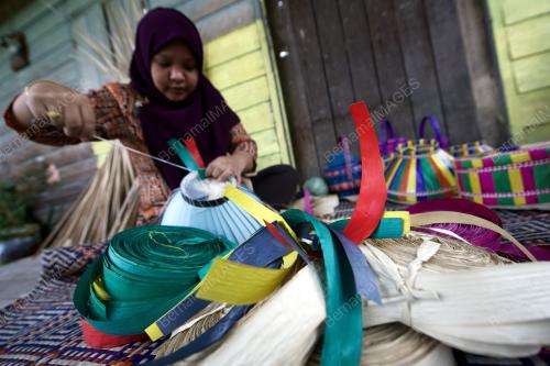 TUDUNG DUANG KOTA BELUD