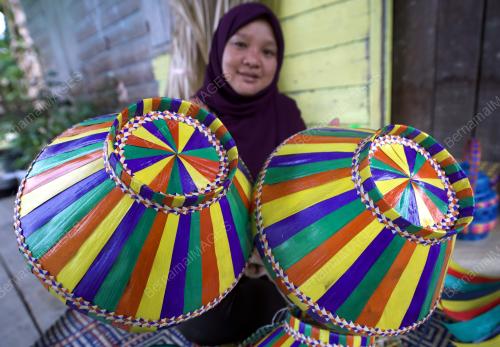 TUDUNG DUANG KOTA BELUD
