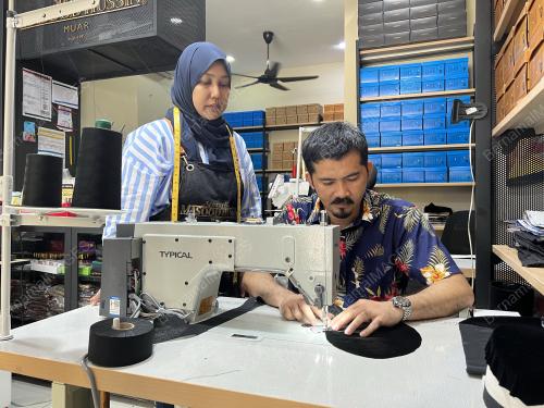 SONGKOK LIPAT MASOOD HUSSIN