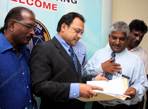 T. MURUGIAH