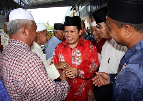 AHMAD MASLAN