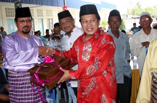 AHMAD MASLAN