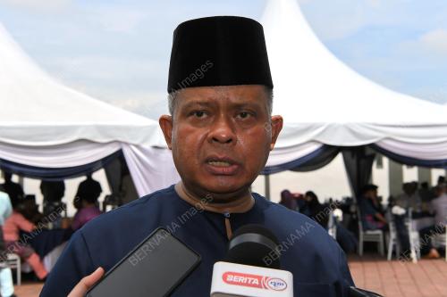 DATUK KAMARUL ZAMAN MAMAT