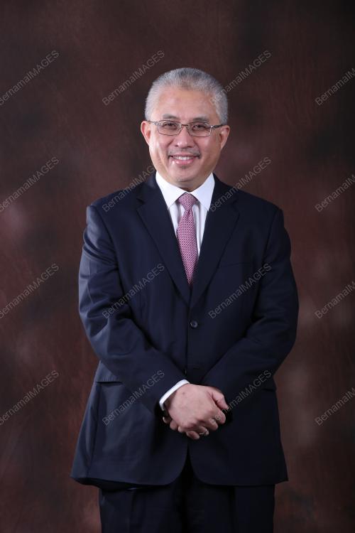 TAN SRI AZMAN MOKHTAR