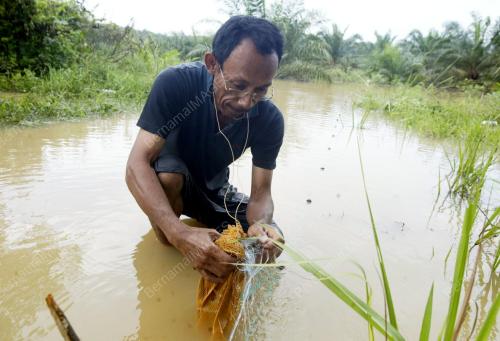 JB20_02022011_REZEKI_BANJIR