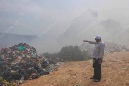 KEBAKARAN TERBUKA DI PUSAT PELUPUSAN SAMPAH SEMENTARA