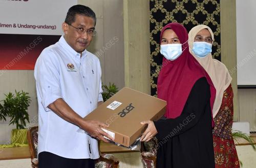 DATUK TAKIYUDDIN HASSAN