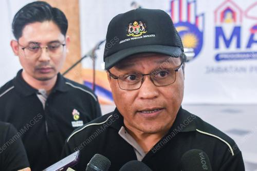 TAN SRI MOHD DUSUKI MOKHTAR