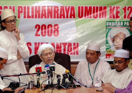 NIK AZIZ