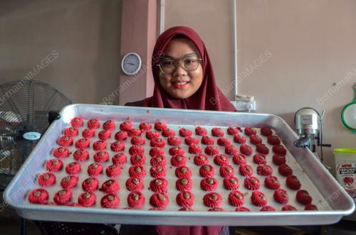 PENGUSAHA BISKUT RAYA
