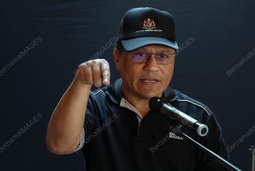 TAN SRI MOHD DUSUKI MOKHTAR