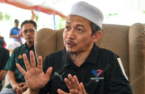 NIK MOHAMAD ABDUH NIK ABDUL AZIZ
