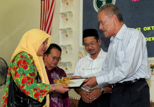TAN SRI DATUK MUHAMMAD MUHAMMAD TAIB