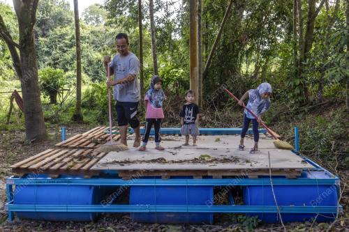 PENDUDUK RANTAU PAJANG PERSIAPAN MENHADAPI BANJIR