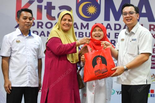 NIK KAMARUZAMAN NIK HUSIN