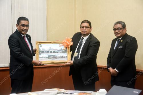 DATUK TAKIYUDDIN HASSAN
