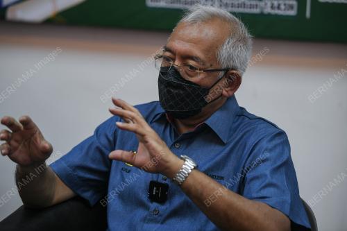 DATUK SERI MAHDZIR KHALID