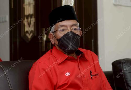 DATUK SERI MAHDZIR KHALID