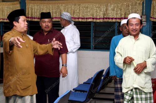AHMAD MASLAN