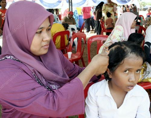 HELZA ANIS HUSIN
