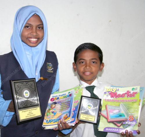 DUA BERADIK TERIMA ANUGERAH CEMERLANG