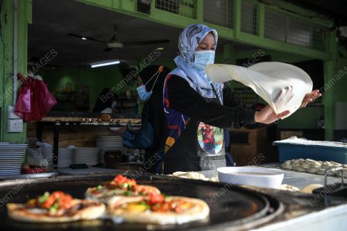 PENEBAR ROTI WANITA
