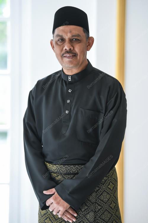 MUHAMMAD RADHI MAT DIN