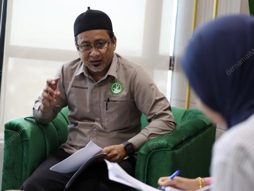 ZAMAKHSHARI MUHAMAD