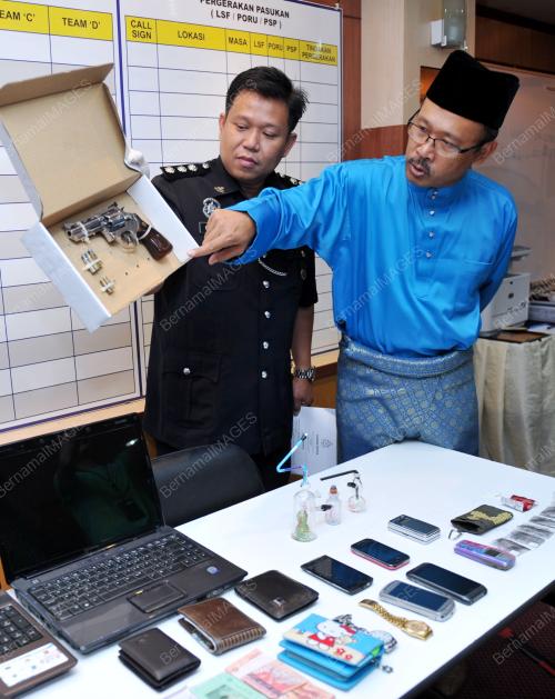 KL01_26102012_POLIS_PISTOL