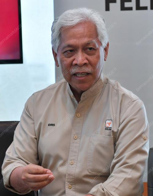 TAN SRI IDRIS JUSOH