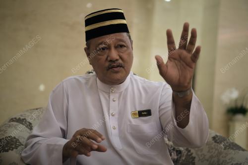 RUSLI ASRI