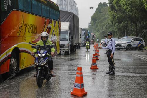 TINJAUAN POLIS TRAFIK