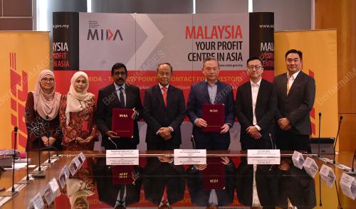 SIGNING BETWEEN MIDA AND DHL EXPRESS