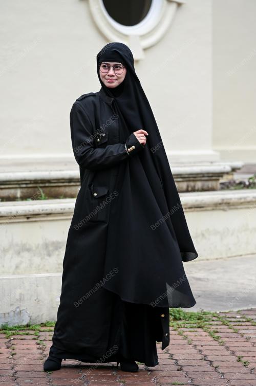 DATIN HELIZA HELMI