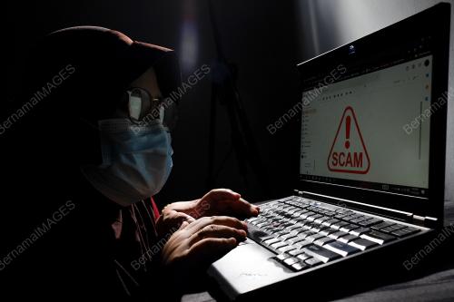 TINJAUAN AKTIVITI PENIPUAN WANG MELALUI E-MEL DAN MEDIA SOSIAL