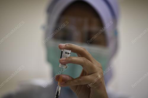 PROGRAM VAKSINASI COVID-19 PERINGKAT KEMENTERIAN PERTAHANAN