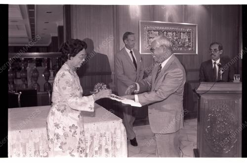 HANDING OVER NEW YAN