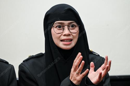 DATIN HELIZA HELMI
