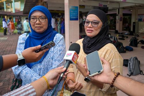 DINIHARIYANTI RUSMAN