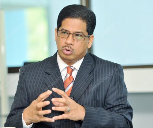 DATUK KHAIRIL ANUAR AZIZ